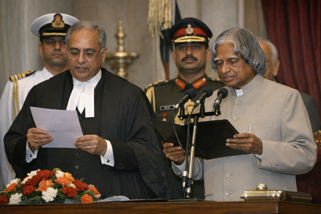 A senior Indian leader taking an oath during a formal ceremony, with an official reading the oath and Indian defence officials and scientists walking at the Pokhran nuclear test site with a nuclear test explosion cloud in the background.